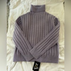 Girls purple turtle neck.